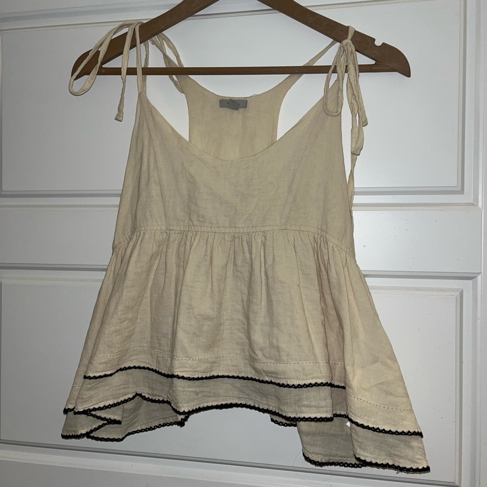 Ecote Cream Sleeveless Shoulder Tie Tiered Top with Black Trim.size M like new